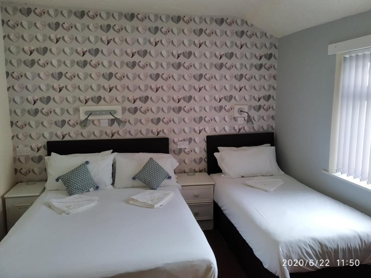 Dreibettzimmer mit eigenem Bad