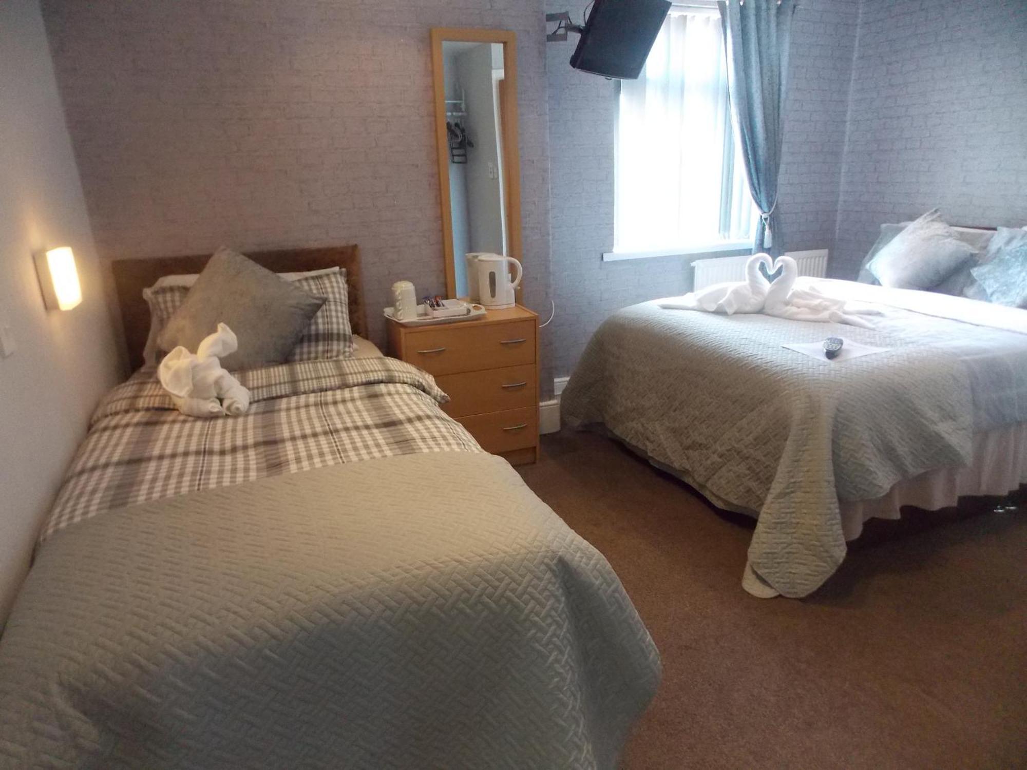 Deluxe Triple Room