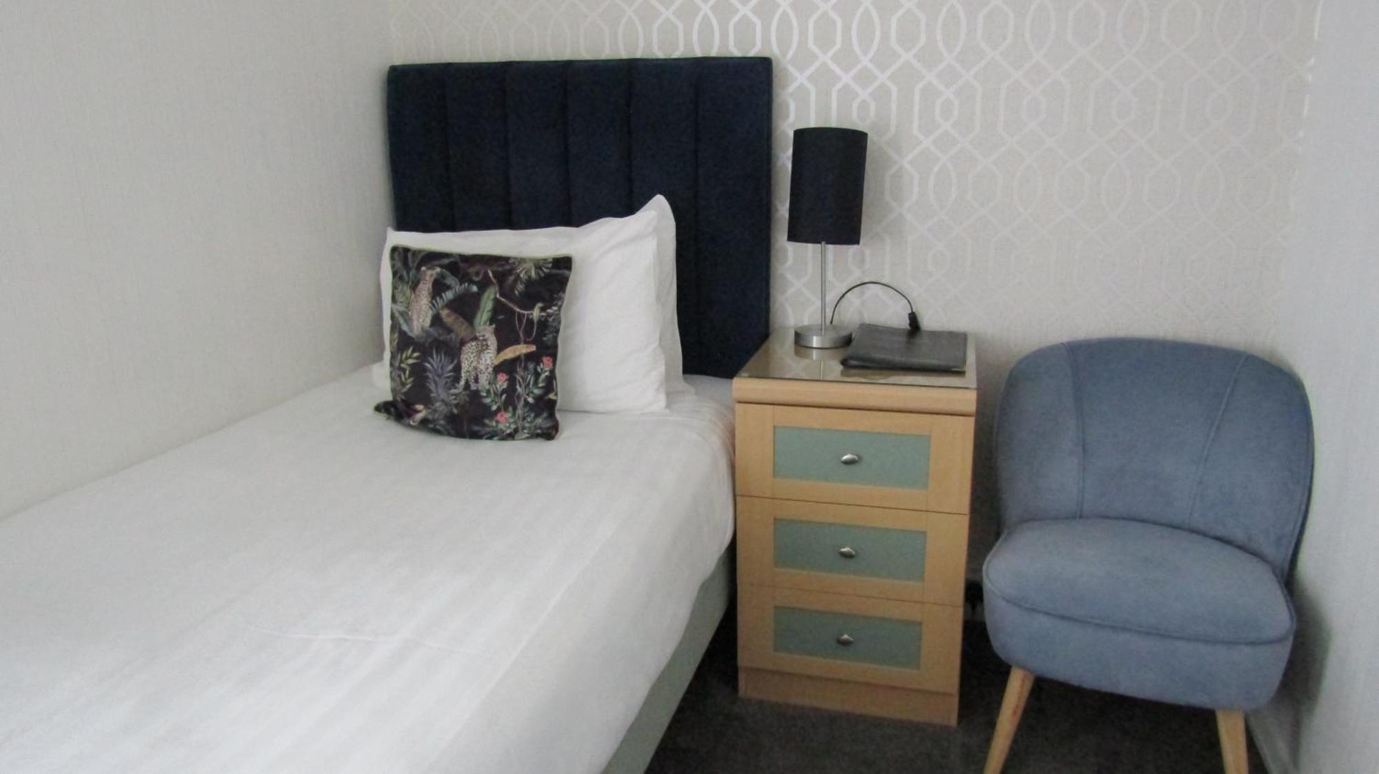 Single Room with Shared Shower and Toilet