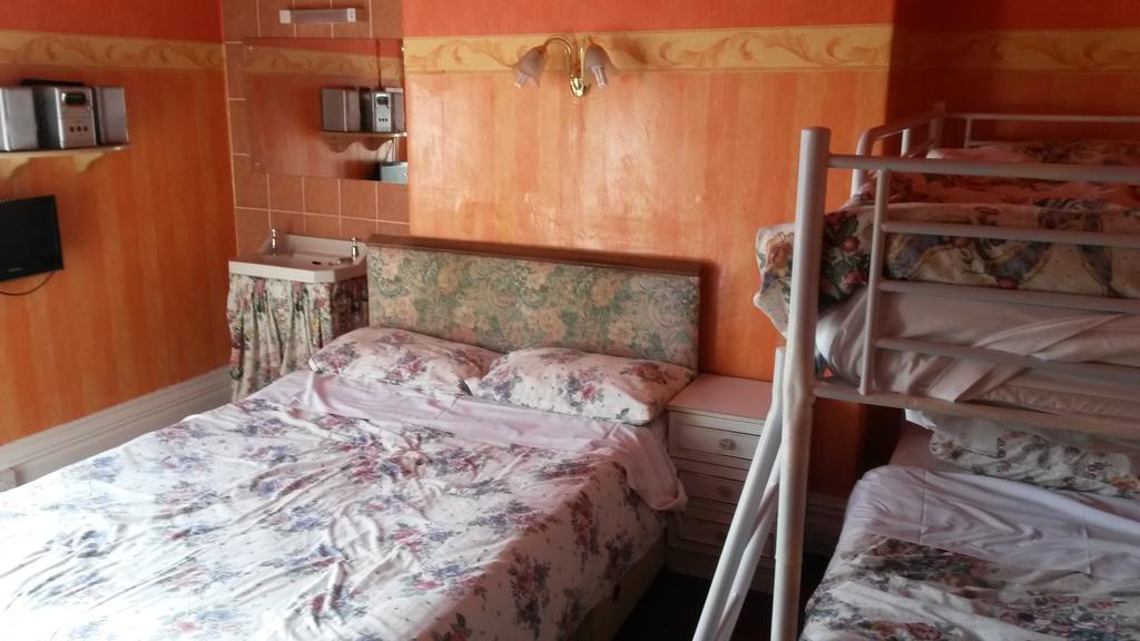 Quadruple Room with Shared Bathroom